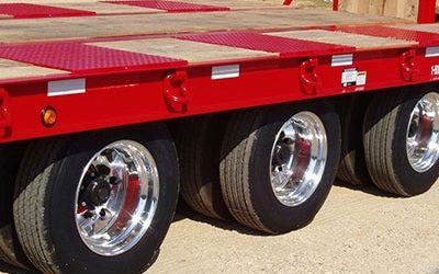 A Fire Truck Parked In Front Of A Car